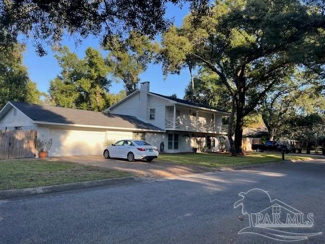 a stove top oven sitting inside of a kitchen
