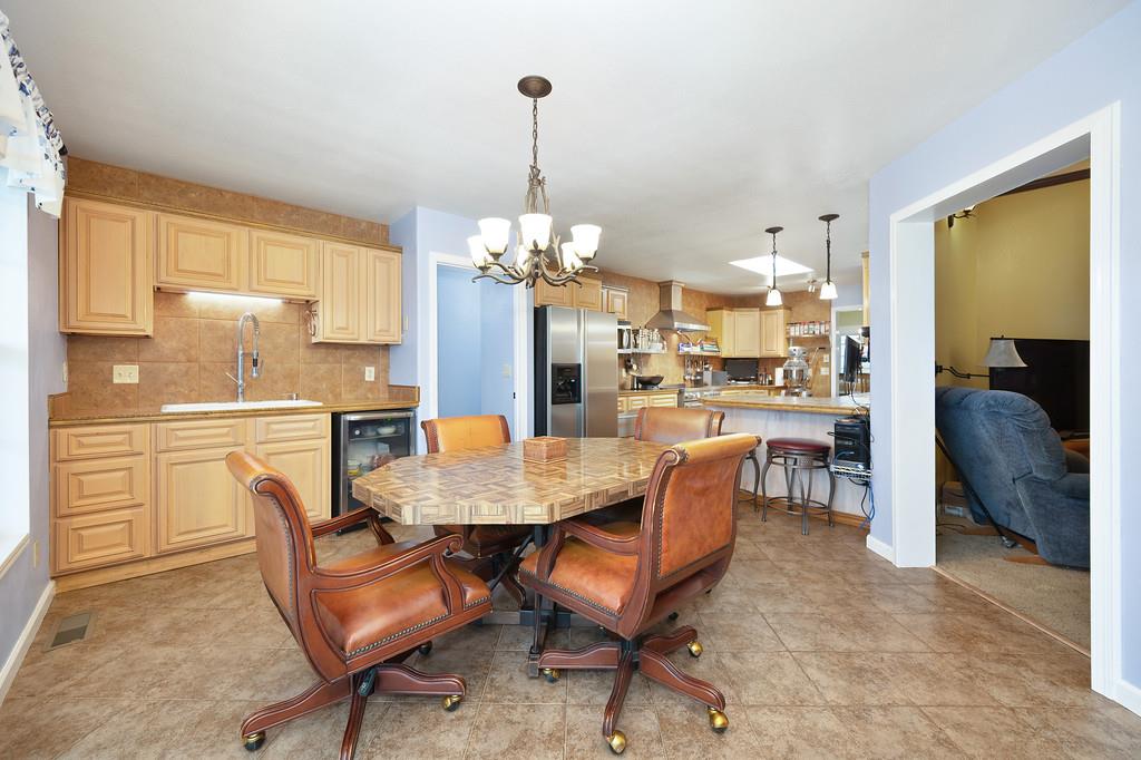 12156 Scott Grant Road Marysville, CA 95901 - Photo 32 of 77 a view of a dining room with furniture and a chandelier