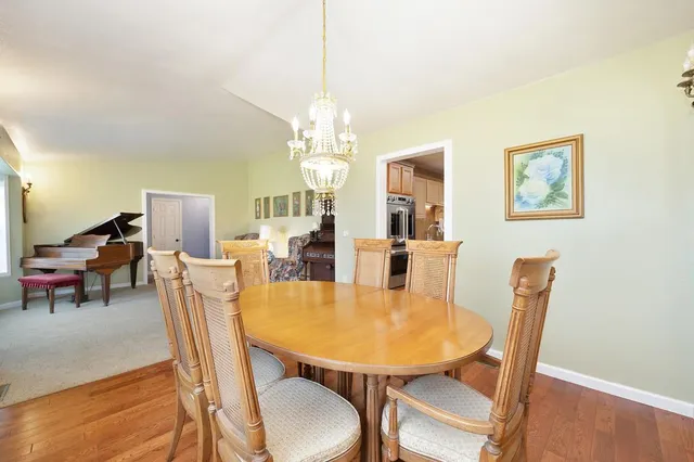 a kitchen with cabinets and window
