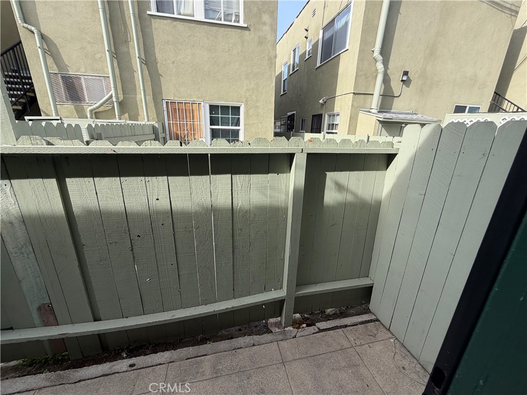 1917 East 4th Street, Unit 9 Long Beach, CA 90802 - Photo 13 of 14 a view of a bathroom with sink and mirror