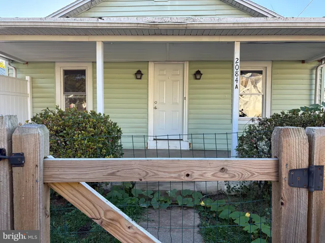 a view of house with outdoor space