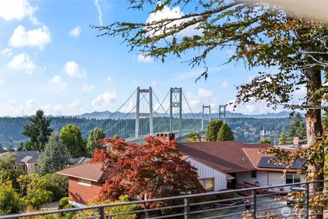 a view of walk in closet and bedroom view