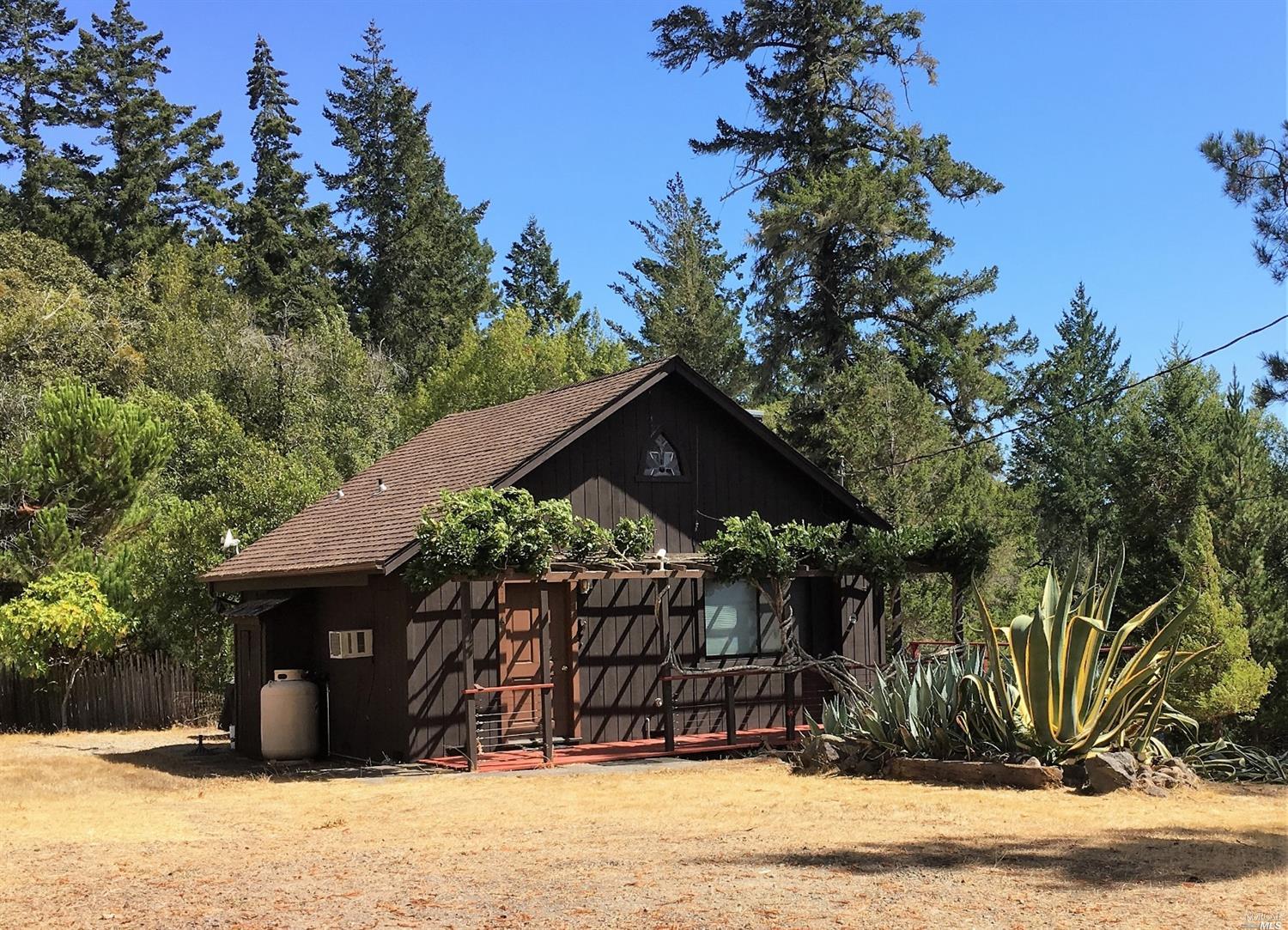 1555 Smith Hills Road Philo, CA 95466 - Photo 1 of 1 a view of a house with a tree