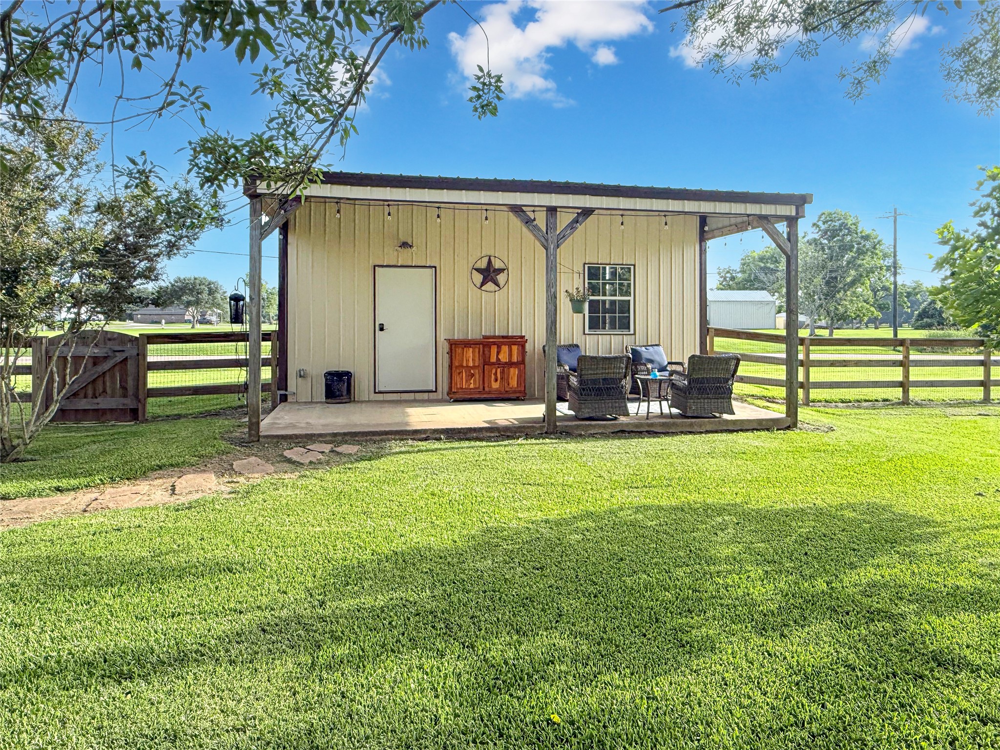 807 Mill Road Angleton, TX 77515 - Photo 6 of 46 Spacious workshop with lean-to for projects and storage.