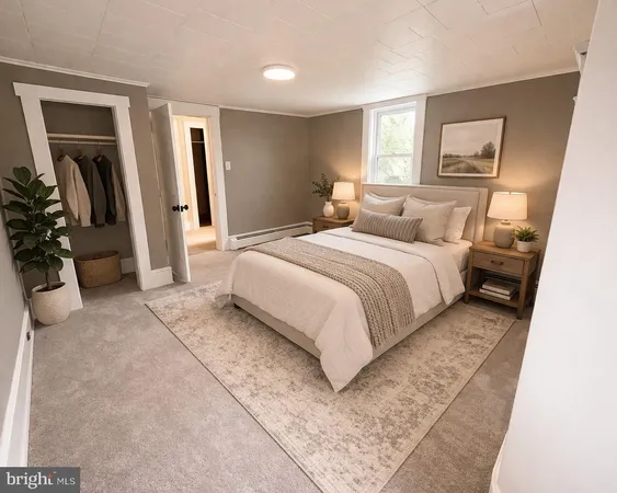 a bedroom with a bed a mirror and dresser