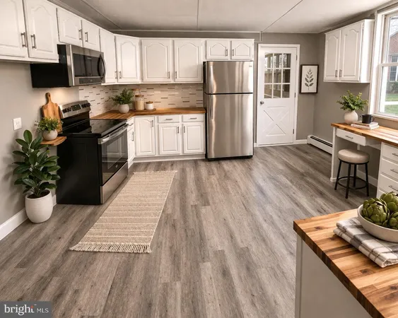 a kitchen with a refrigerator and wooden cabinets
