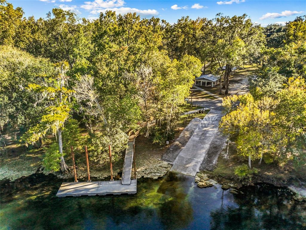 0 Southwest County Road 138 Fort White, FL 32038 - Photo 26 of 28 a view of a lake with houses