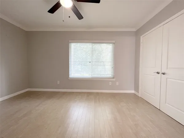 a bathroom with a sink toilet and a mirror