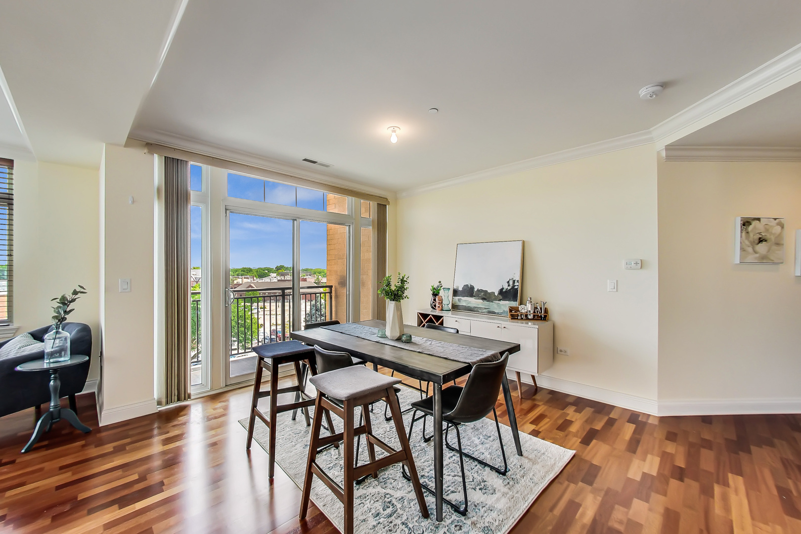 600 West Touhy Avenue, Unit 303 Park Ridge, IL 60068 - Photo 11 of 32 a view of a dining room with furniture window and wooden floor