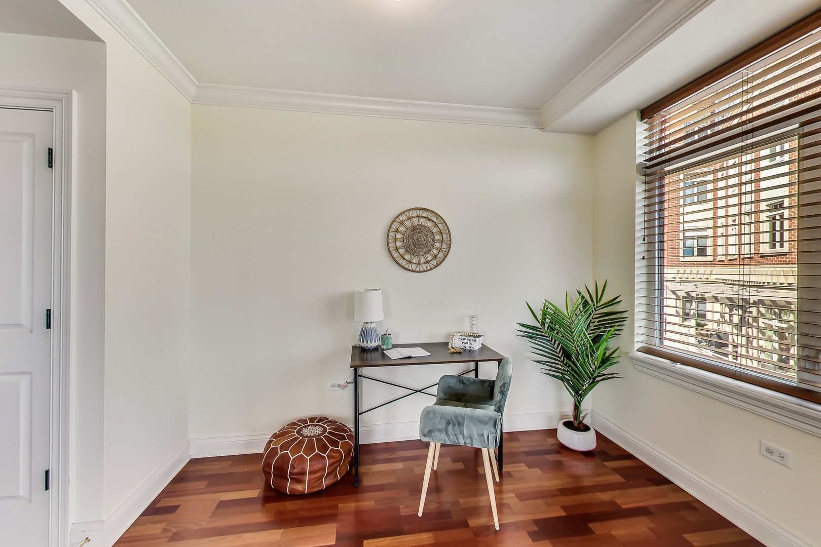 600 West Touhy Avenue, Unit 303 Park Ridge, IL 60068 - Photo 16 of 32 a view of a room that has a table and a chair