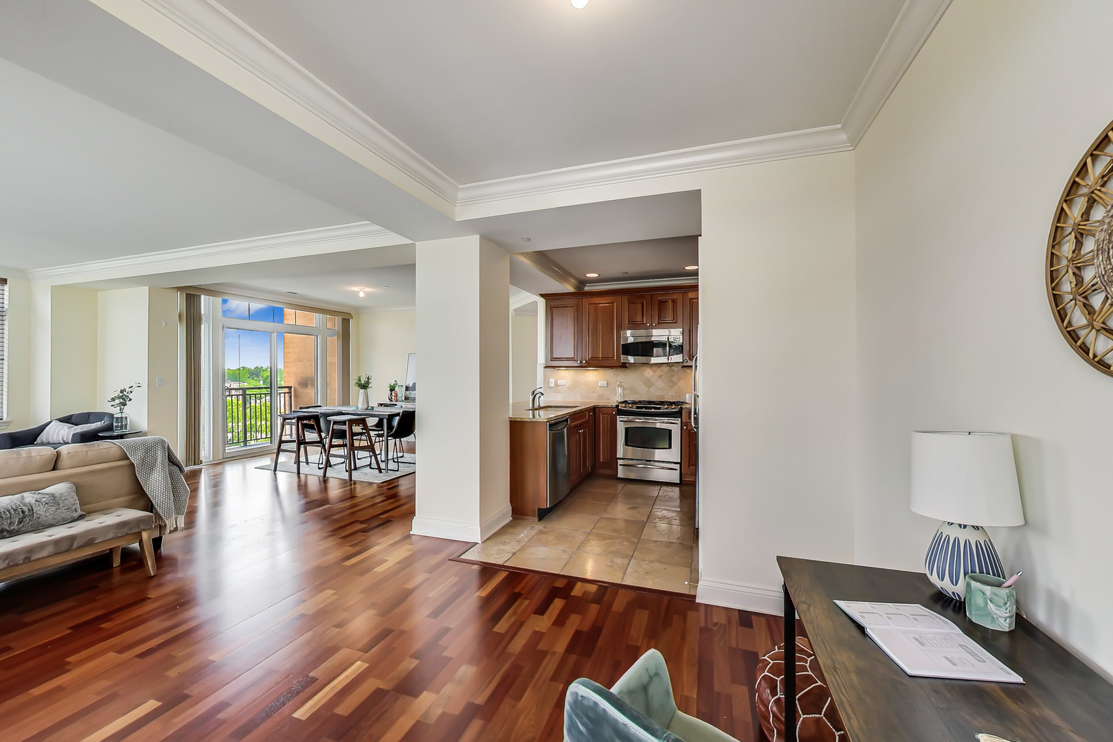 600 West Touhy Avenue, Unit 303 Park Ridge, IL 60068 - Photo 18 of 32 a living room with furniture wooden floor and a table