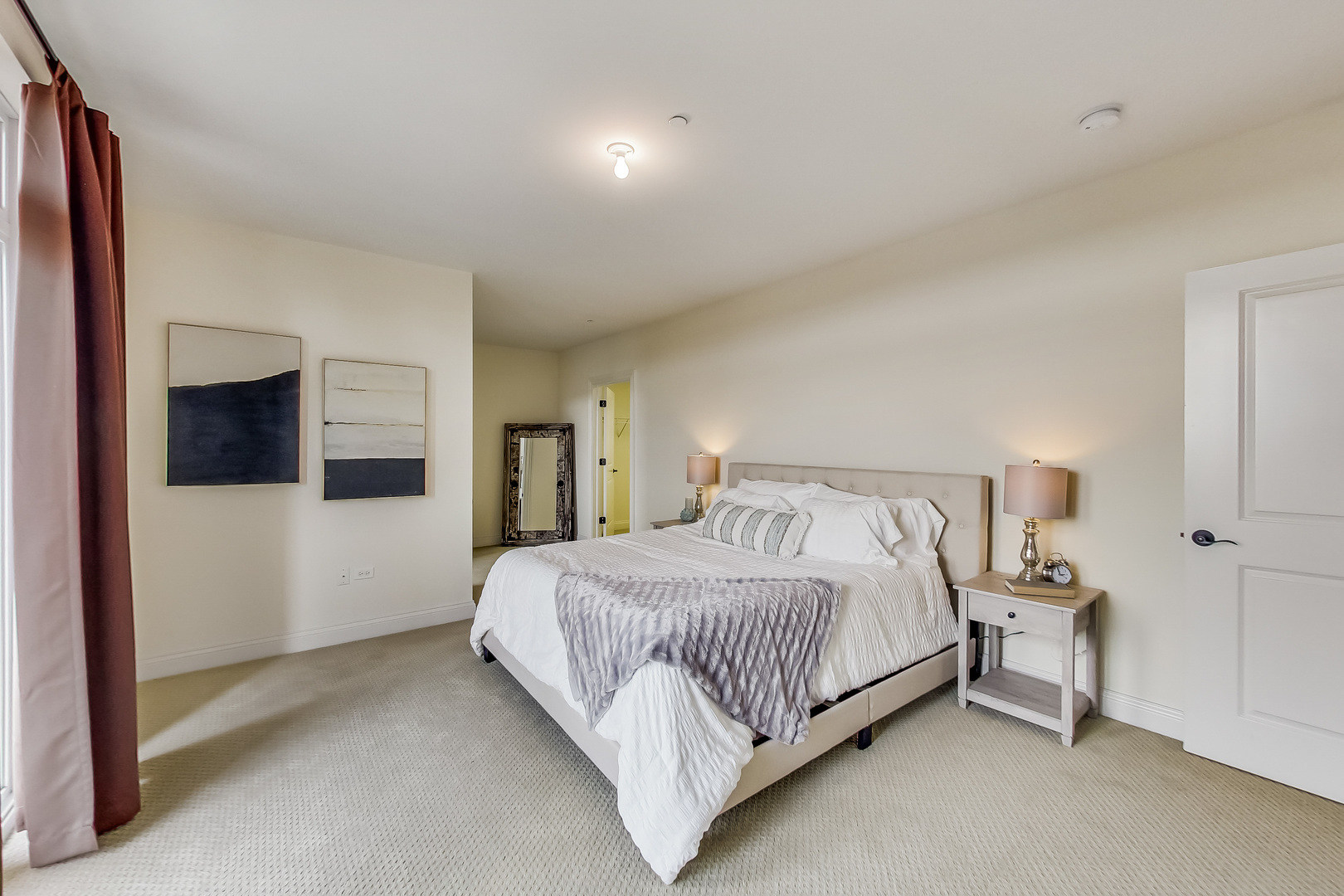 600 West Touhy Avenue, Unit 303 Park Ridge, IL 60068 - Photo 19 of 32 a bedroom with a bed and a television