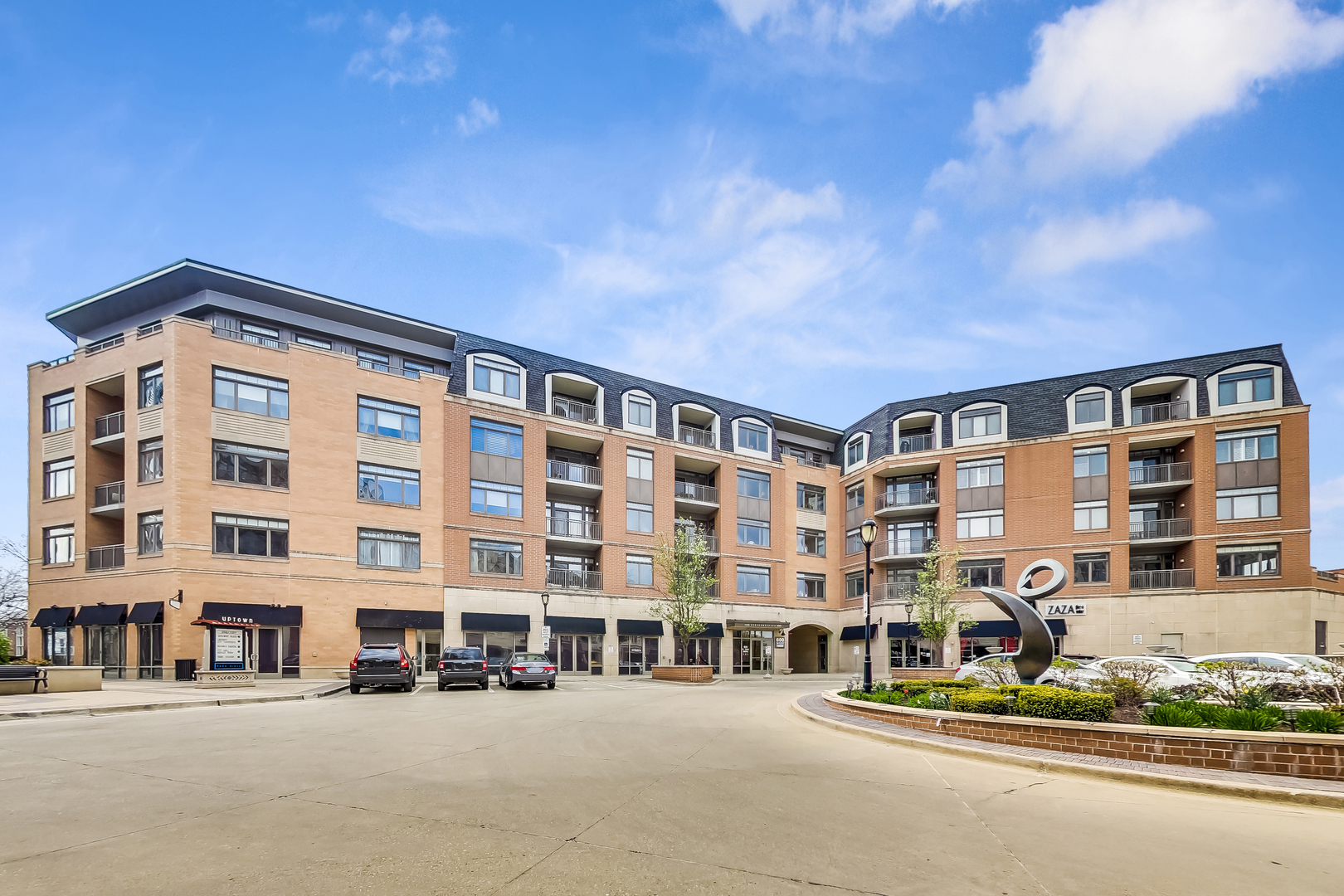 600 West Touhy Avenue, Unit 303 Park Ridge, IL 60068 - Photo 2 of 32 a front view of a building with street view