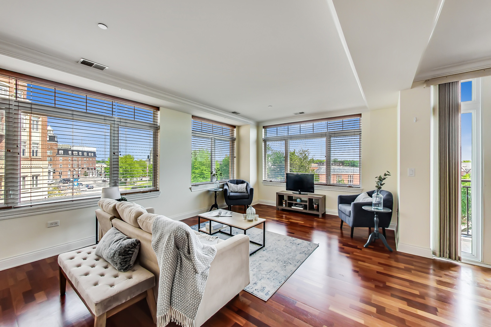 600 West Touhy Avenue, Unit 303 Park Ridge, IL 60068 - Photo 7 of 32 a living room with furniture and a large window
