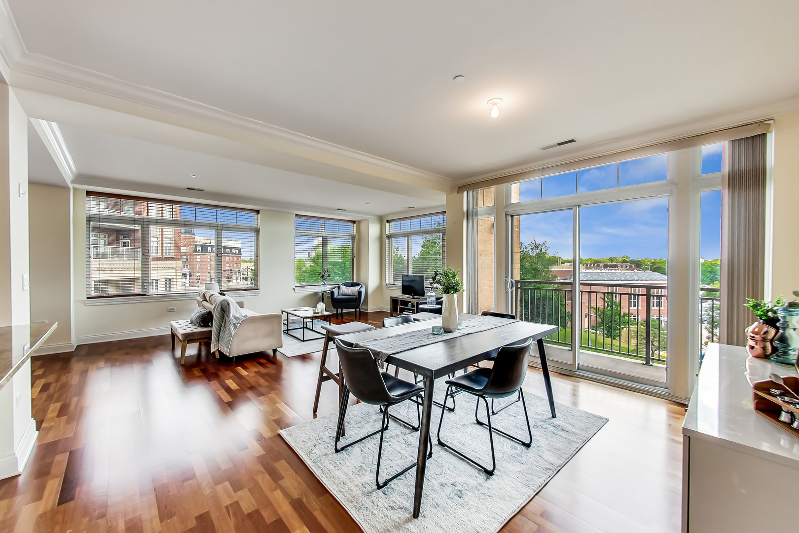 600 West Touhy Avenue, Unit 303 Park Ridge, IL 60068 - Photo 10 of 32 a view of a dining room with furniture window and wooden floor