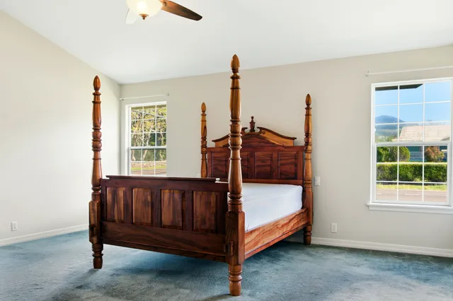 a bedroom with a bed and furniture