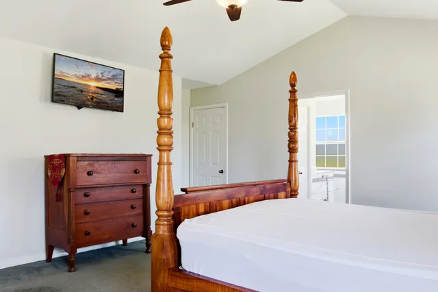 a bathroom with a sink and a window