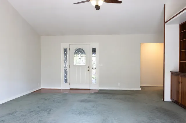 an empty room with windows