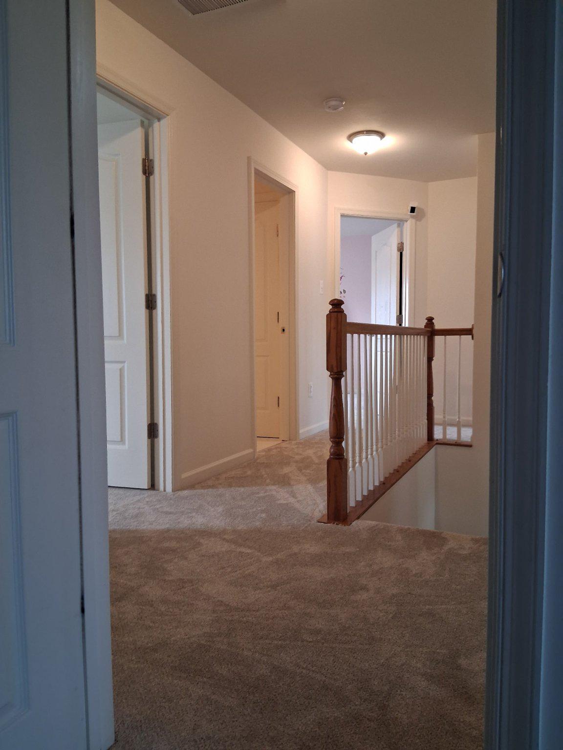 13944 Seneca Ridge Drive Hagerstown, MD 21740 - Photo 16 of 41 Inviting hallway with brand new soft carpet.