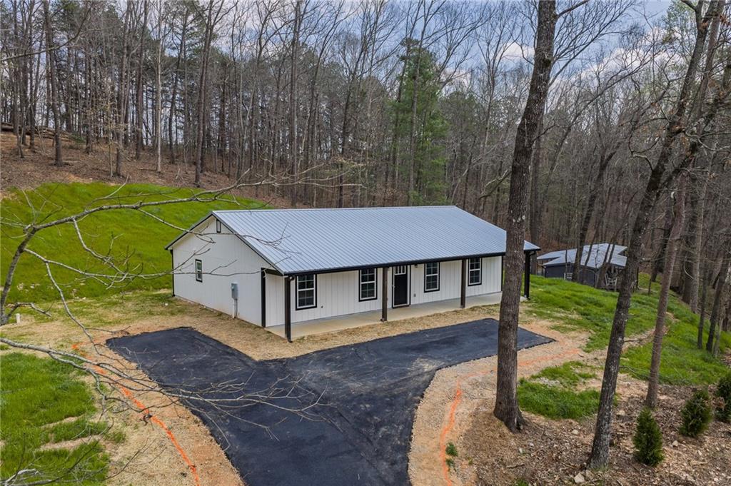 81 Loper Lane Ellijay, GA 30540 - Photo 2 of 29 a house with trees in the background
