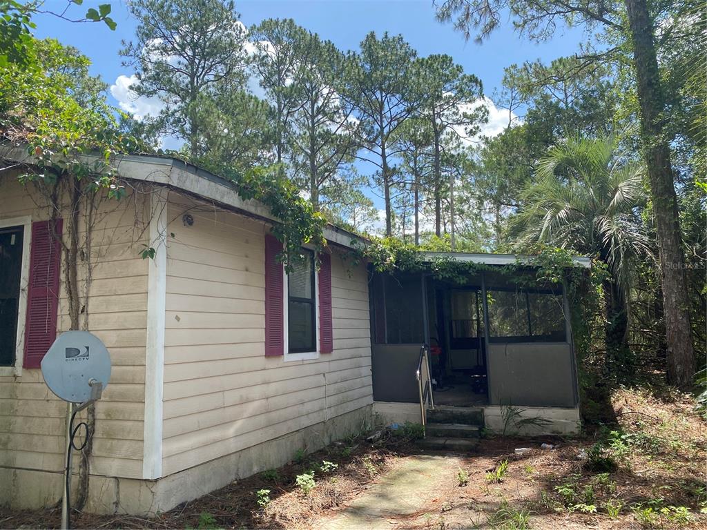 7801 Northeast 192nd Place Citra, FL 32113 - Photo 10 of 32 a view of a porch