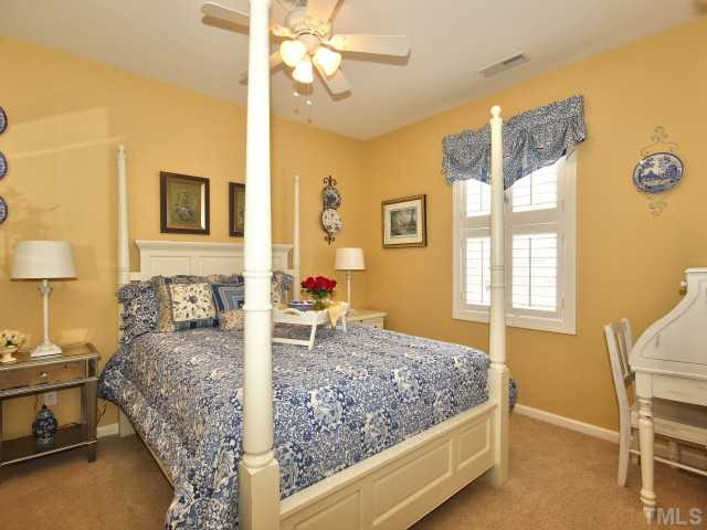 10149 Darling Street Raleigh, NC 27613 - Photo 17 of 25 This third bedroom has carpet, ceiling fan and a closet. Bedroom