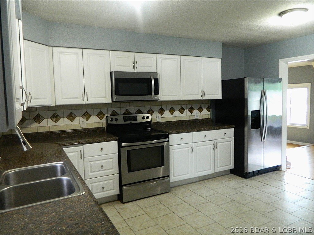 211 Ballenger Road Lake Ozark, MO 65049 - Photo 8 of 28