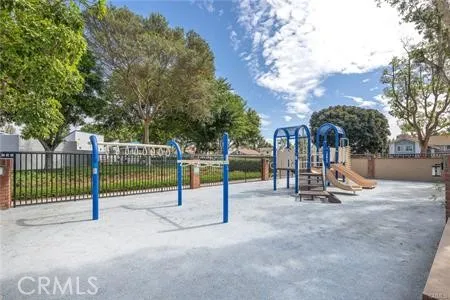 a view of a park with large trees