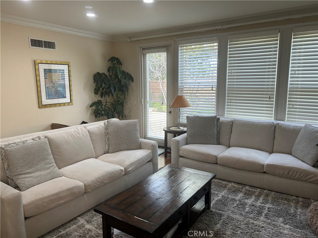 7 Heather Irvine, CA 92620 - Photo 3 of 22 Living Room with plenty of room for the group to watch TV