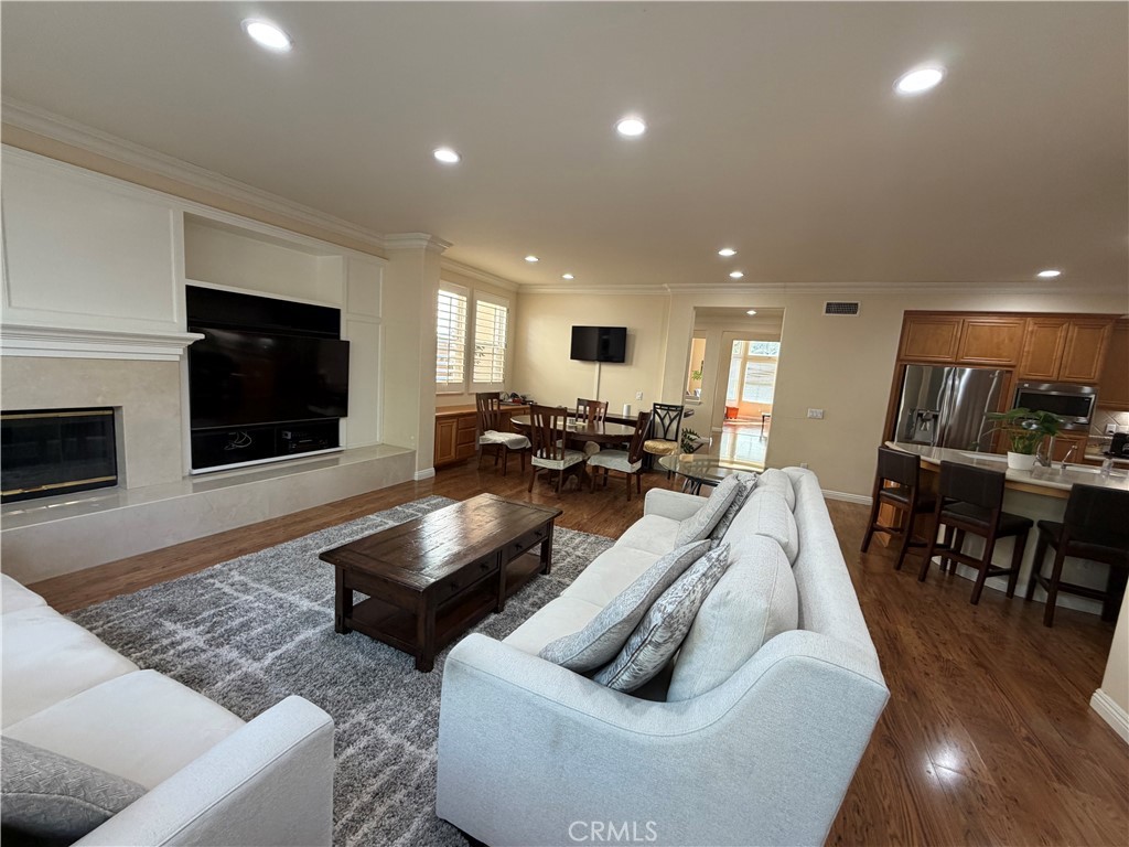 7 Heather Irvine, CA 92620 - Photo 22 of 22 Living Room, Dining Room, with kitchen off to the right. Open floor plan