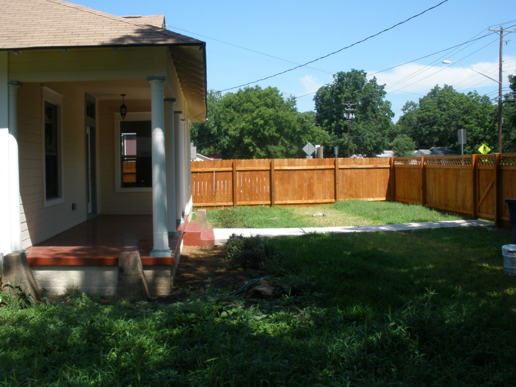 a view of swimming pool with a yard