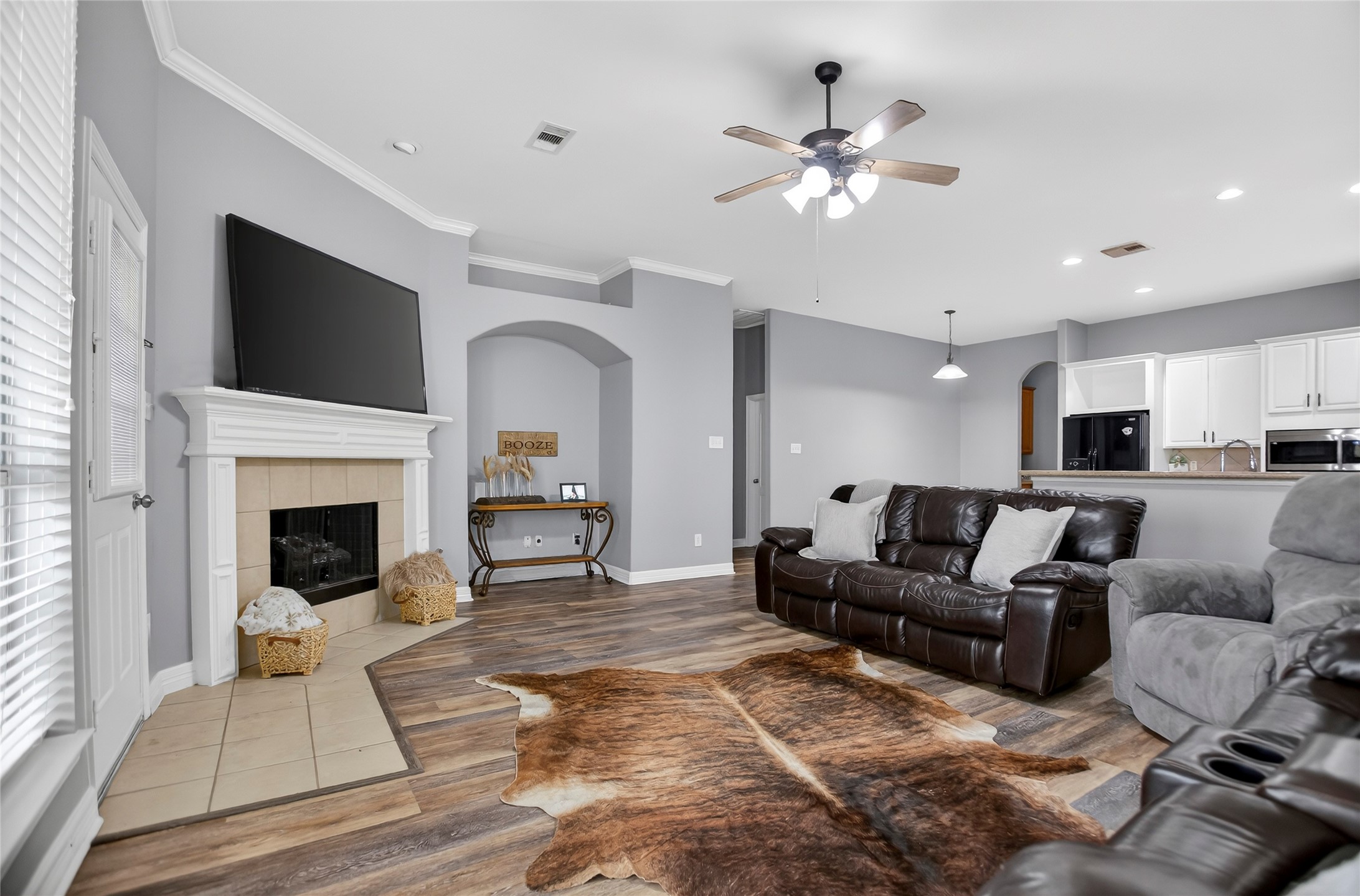 9702 Inwood Circle Baytown, TX 77523 - Photo 13 of 34 The open-plan layout seamlessly connects to a bright kitchen, perfect for entertaining and family gatherings.