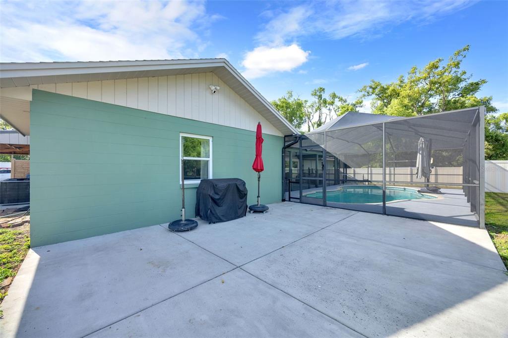 3535 Moores Lake Road Dover, FL 33527 - Photo 55 of 85 Back concrete area for grilling, fire pit, whatever you're waiting!