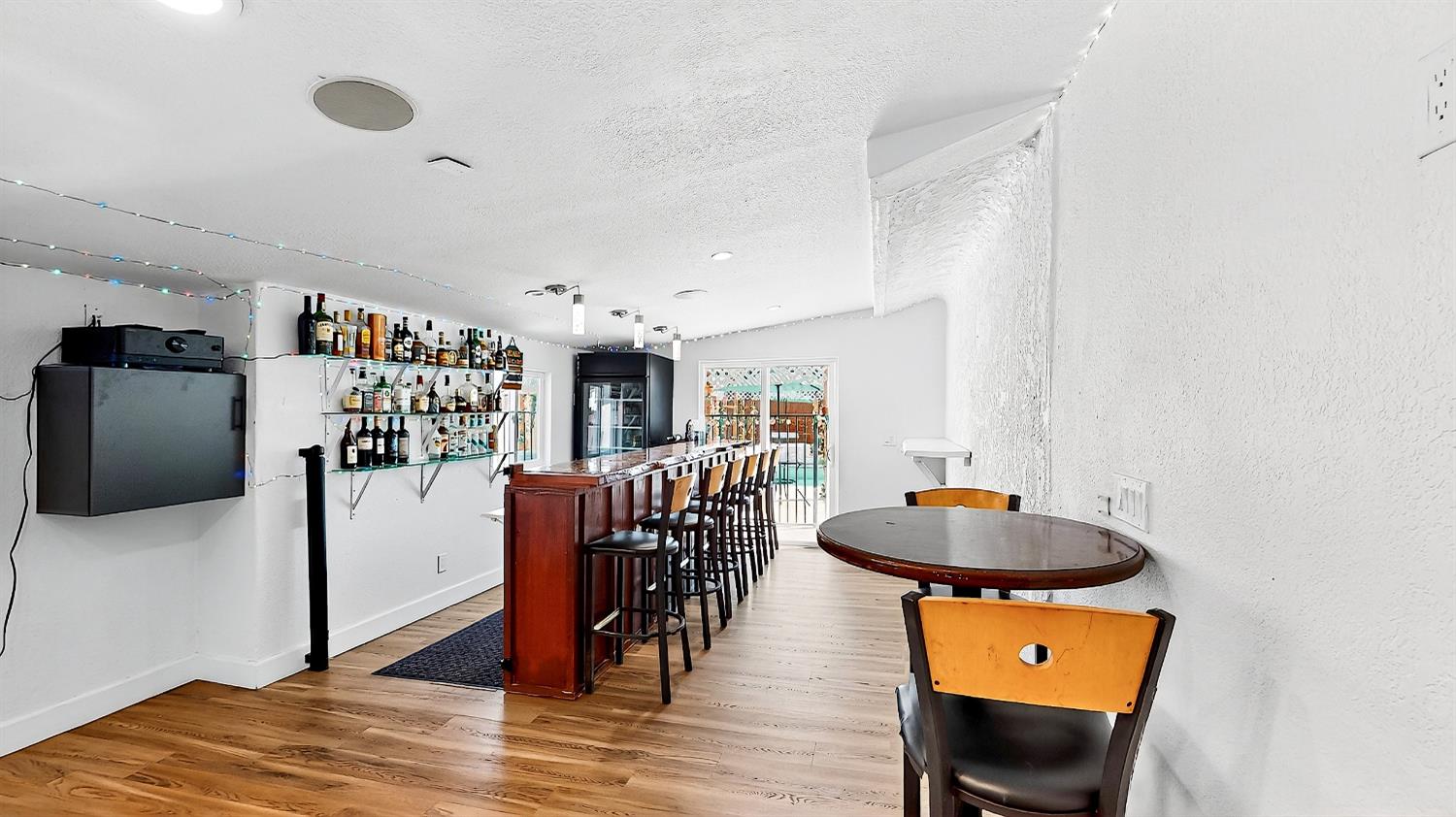 2720 Brooks Court Turlock, CA 95382 - Photo 17 of 50 a living room with furniture and a wooden floor
