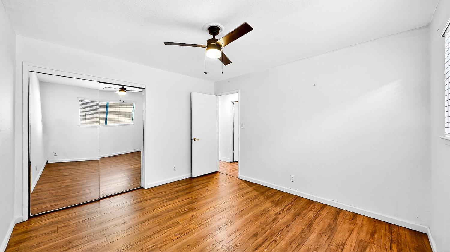 2720 Brooks Court Turlock, CA 95382 - Photo 23 of 50 a view of empty room with wooden floor