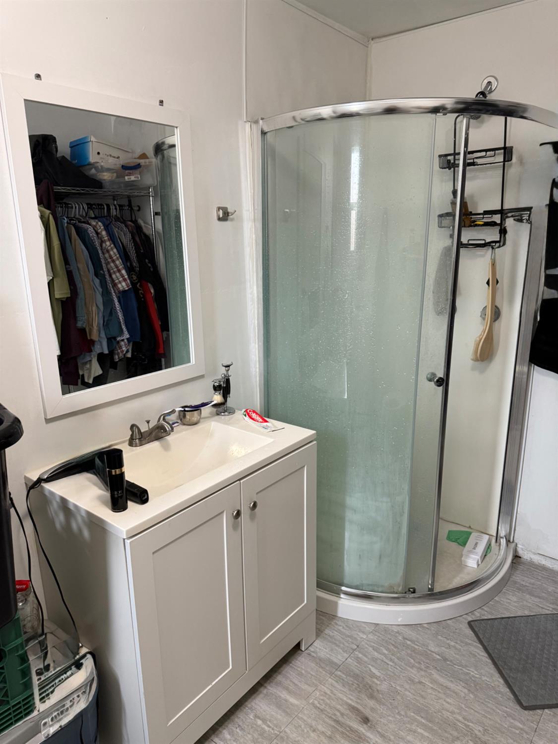 2720 Brooks Court Turlock, CA 95382 - Photo 47 of 50 a utility room with cabinets and washer