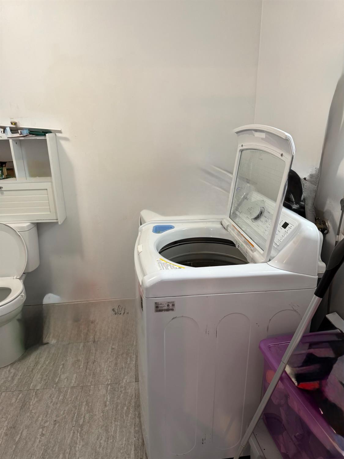 2720 Brooks Court Turlock, CA 95382 - Photo 49 of 50 a utility room with dryer and washer