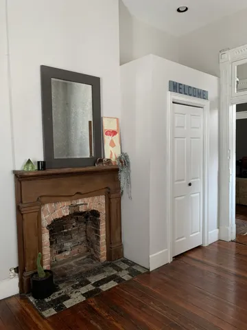 a living room with a fireplace