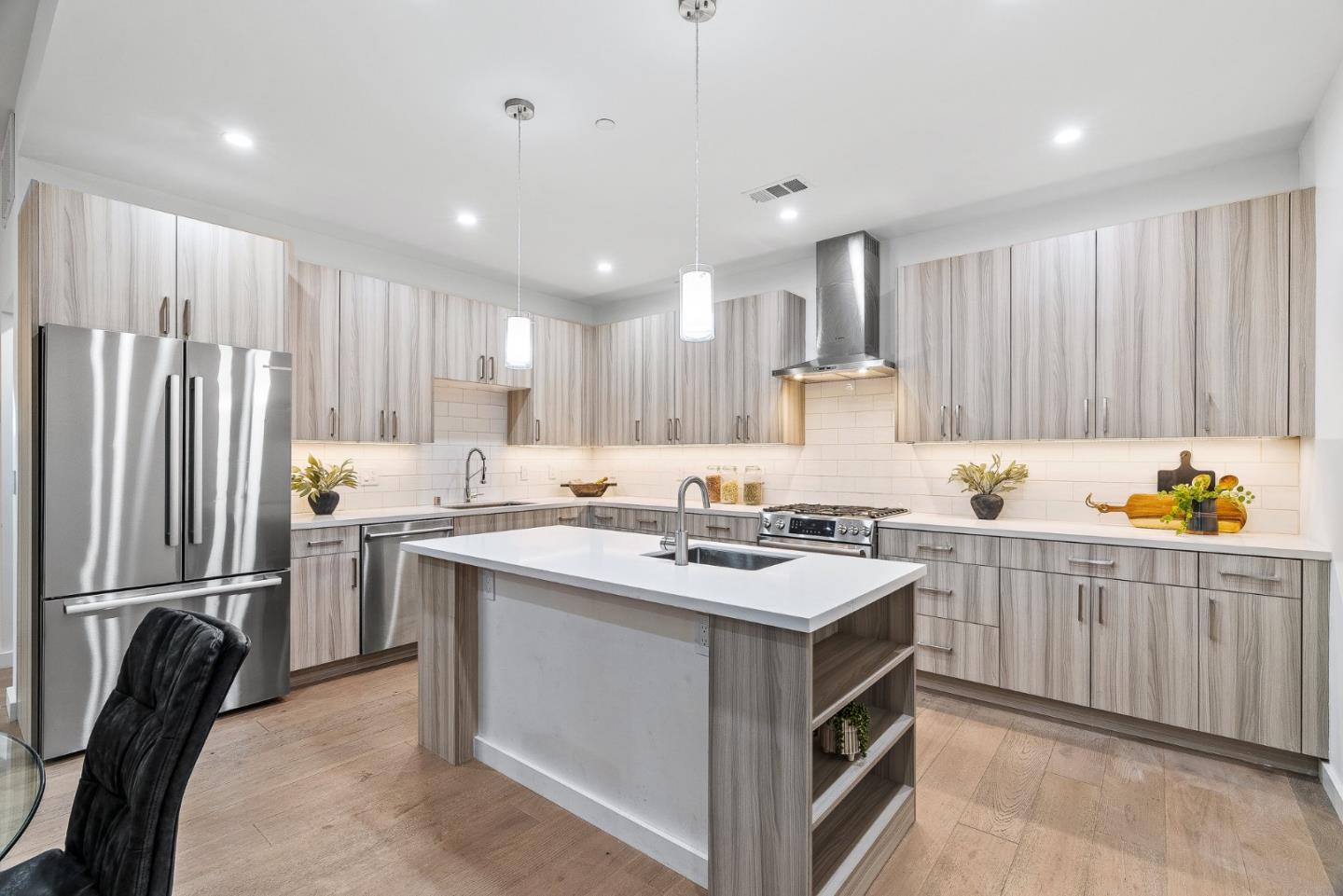 908 Woodside Road Redwood City, CA 94061 - Photo 13 of 34 a kitchen with a sink stove and refrigerator