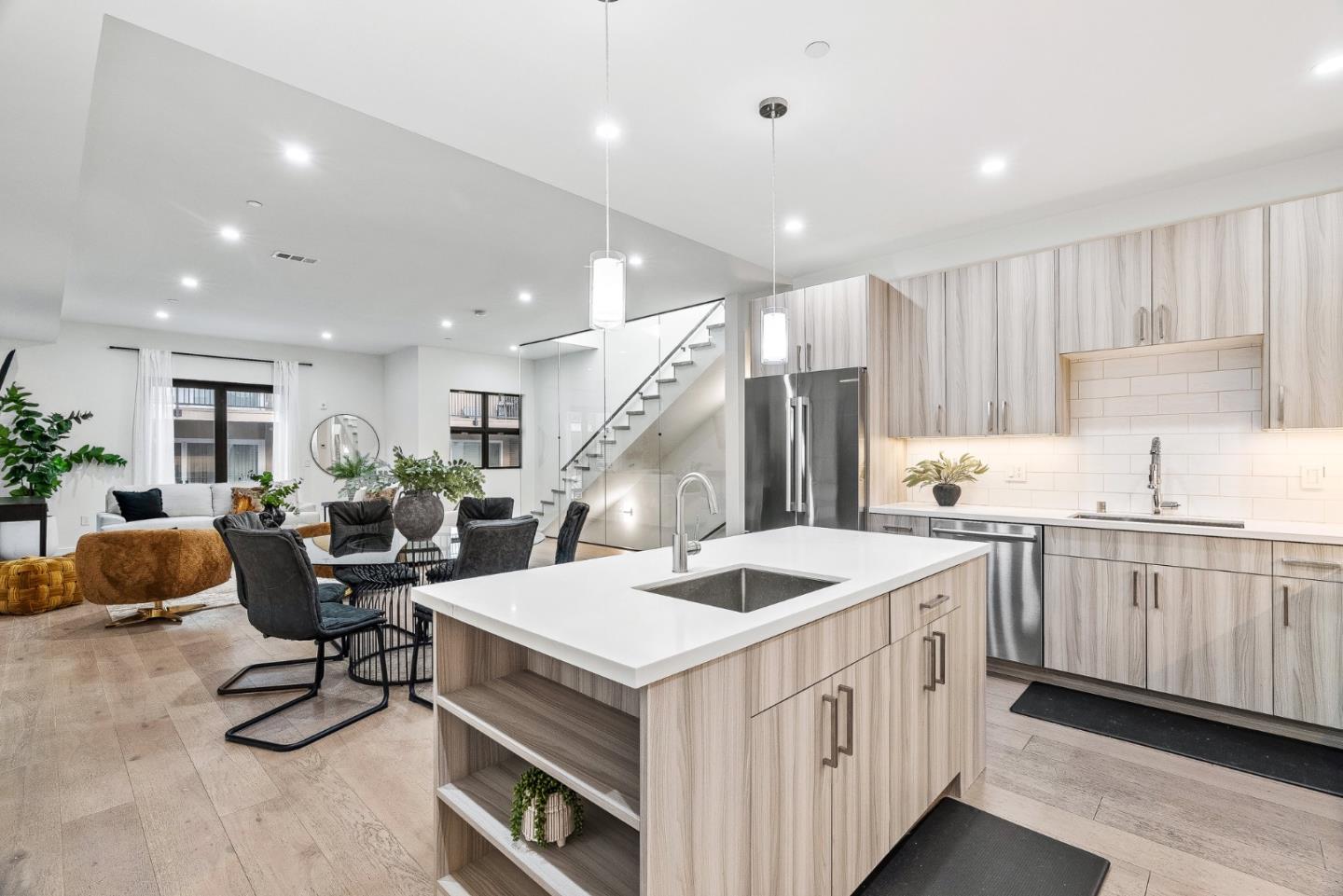 908 Woodside Road Redwood City, CA 94061 - Photo 17 of 34 a kitchen that has a lot of cabinets and wooden floor