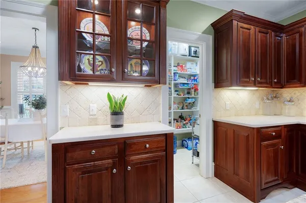 a bathroom with a sink vanity and a mirror