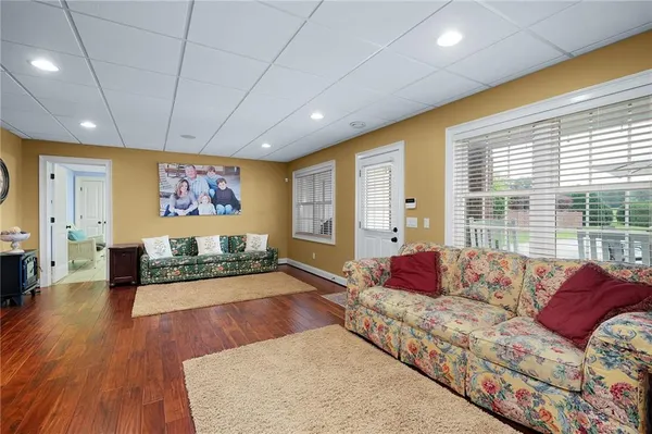 a house view with a flower garden