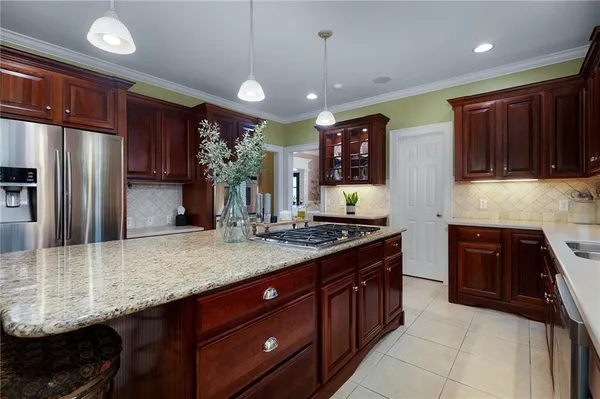 a view of a garden with a building in the background