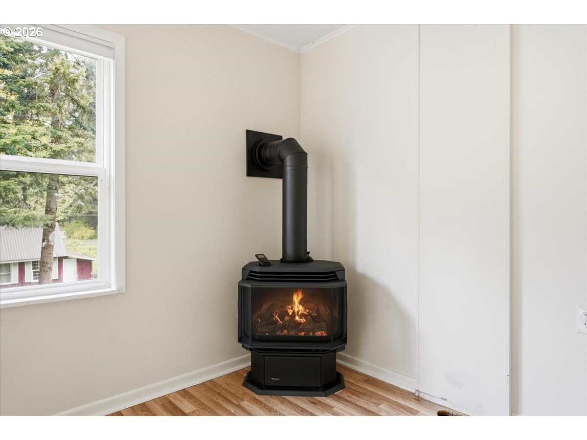 51 Wilkinson Street Carson, WA 98610 - Photo 15 of 37 a living room with furniture and a window
