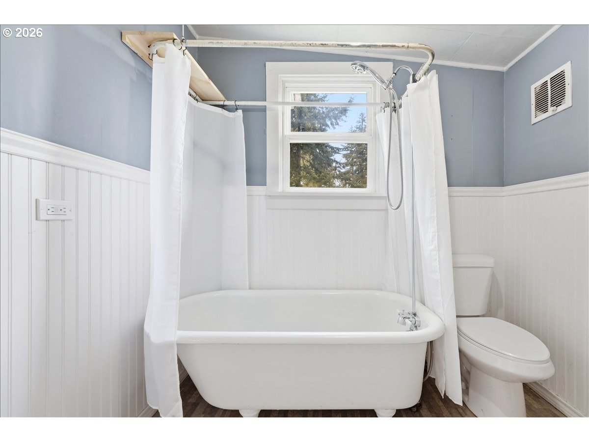 51 Wilkinson Street Carson, WA 98610 - Photo 22 of 37 a bathroom with a bathtub and a shower