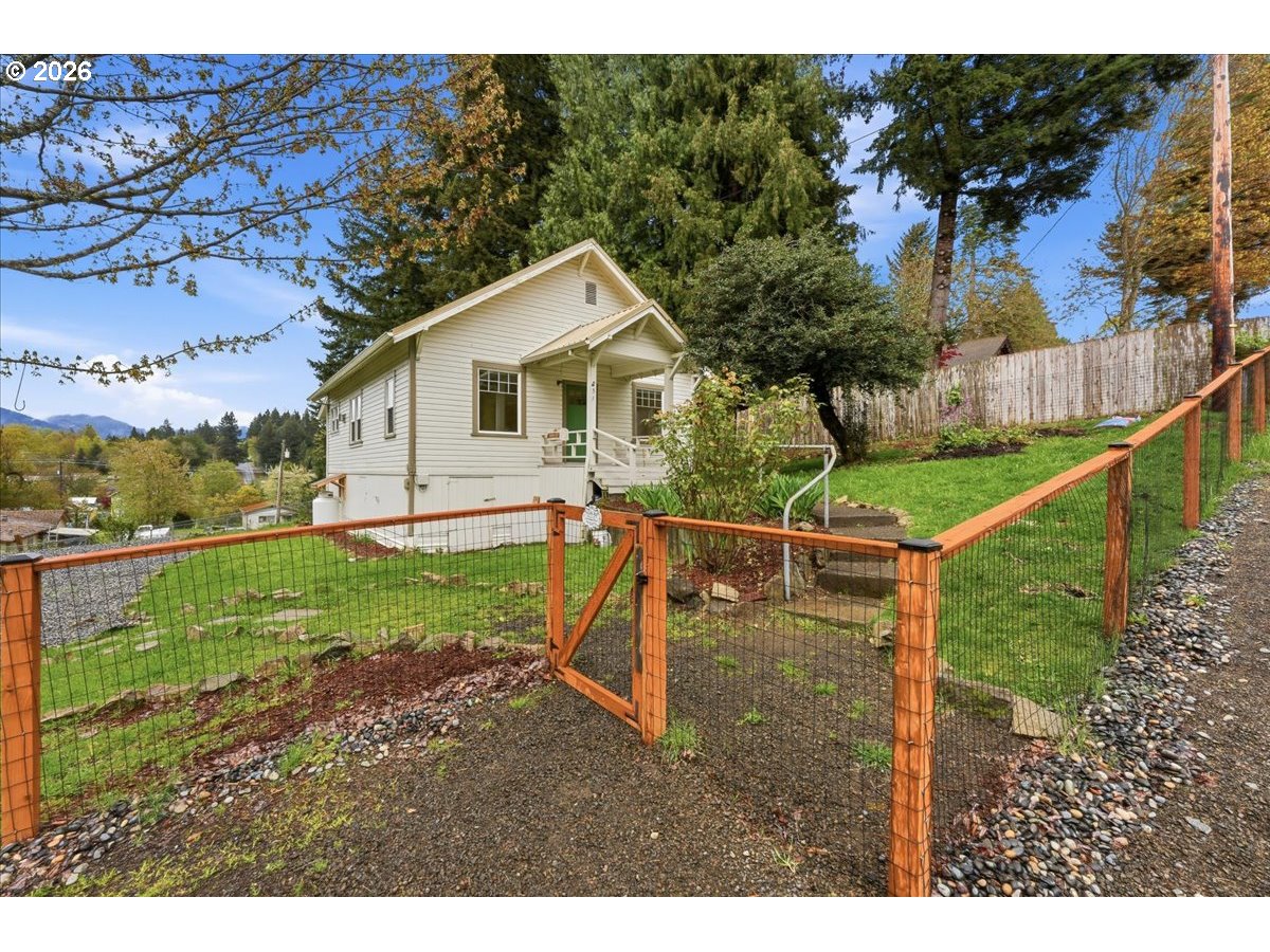51 Wilkinson Street Carson, WA 98610 - Photo 10 of 37 a view of a house with a yard