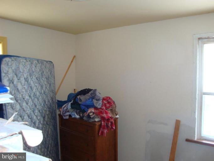 2713 Terrapin Road Silver Spring, MD 20906 - Photo 6 of 10 a living room with furniture and a window
