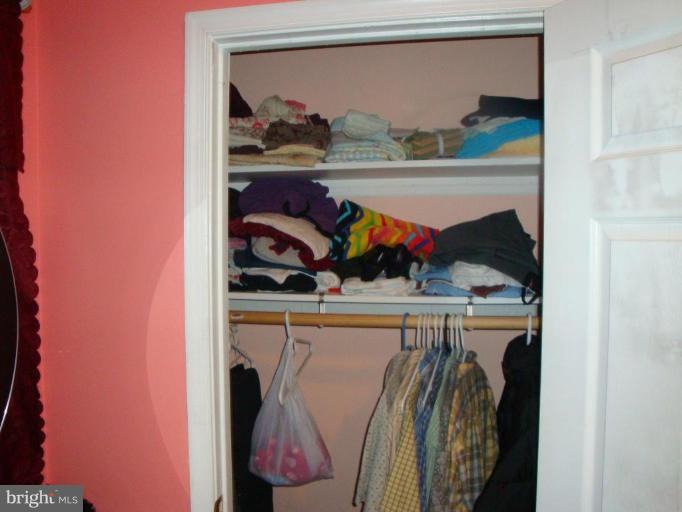 2713 Terrapin Road Silver Spring, MD 20906 - Photo 10 of 10 a view of walk in closet with clothes and shoes