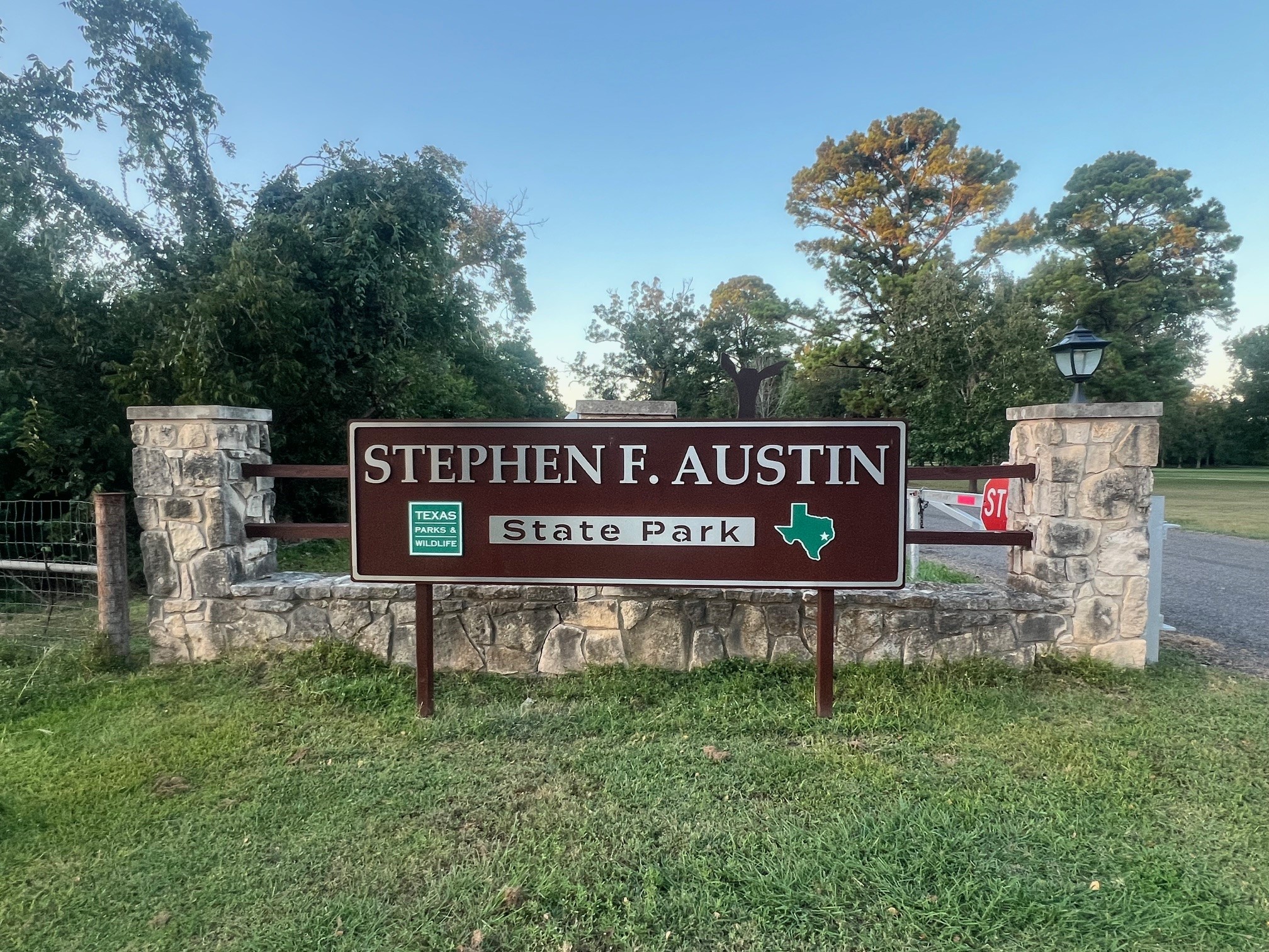 400 6th Street Sealy, TX 77474 - Photo 7 of 11 a view of sign board with large trees