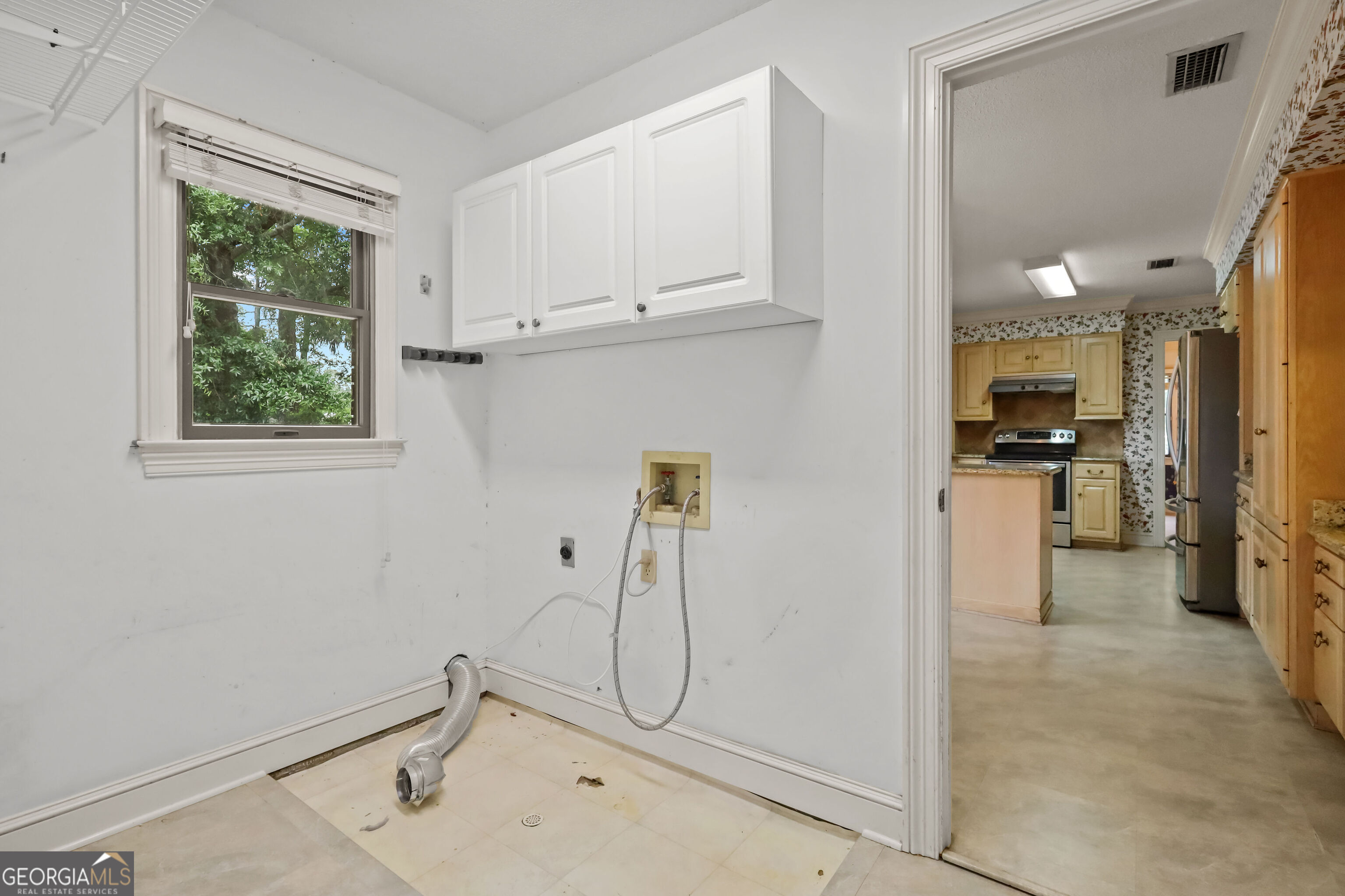 103 Cartwright Circle Brunswick, GA 31525 - Photo 13 of 54 a view of a storage & utility room with a sink